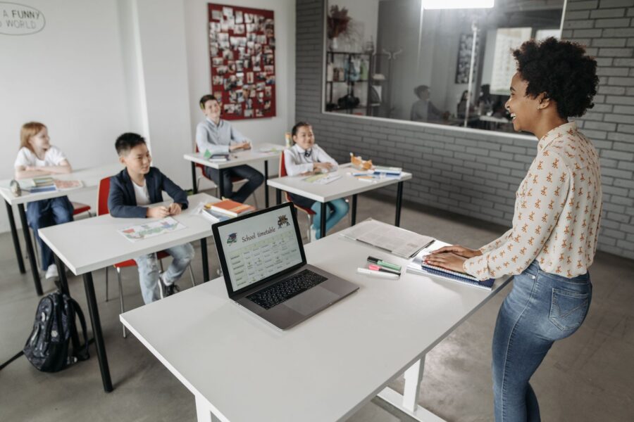 Teacher using laptop