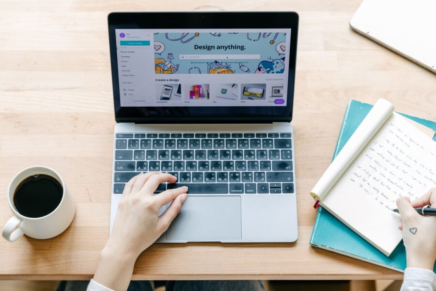 Person typing laptop