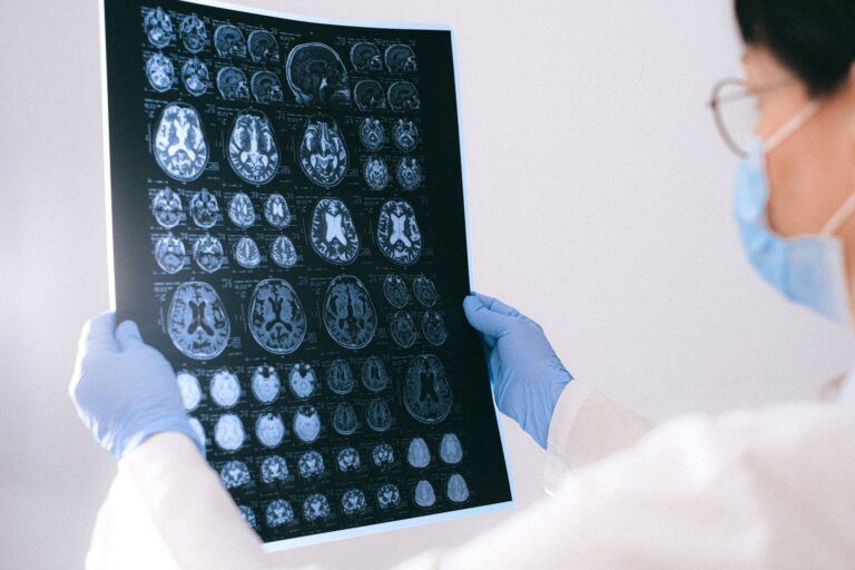 Neuroscientist inspecting brain