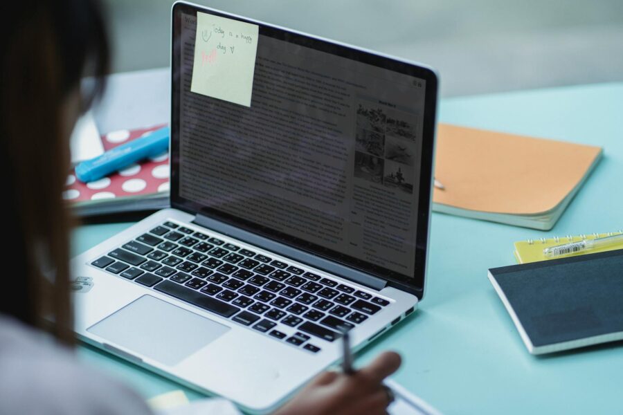 Student studying laptop