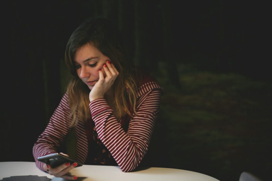 Woman holding smartphone