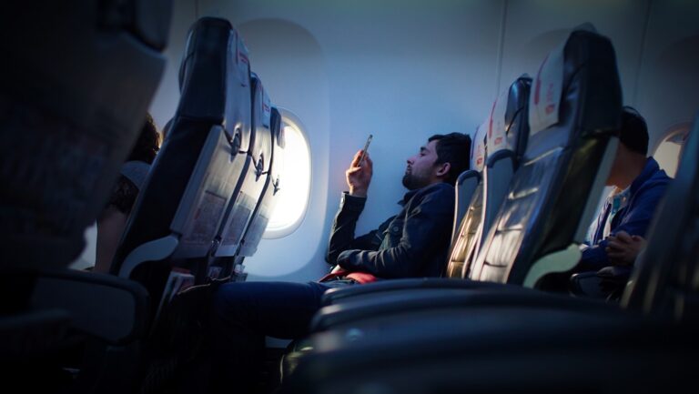 Traveler using smartphone