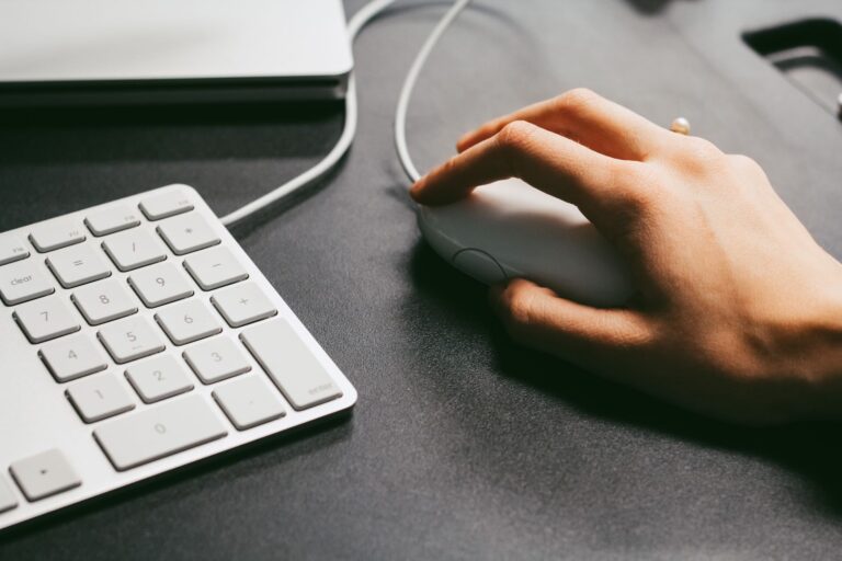 Hand holding computer