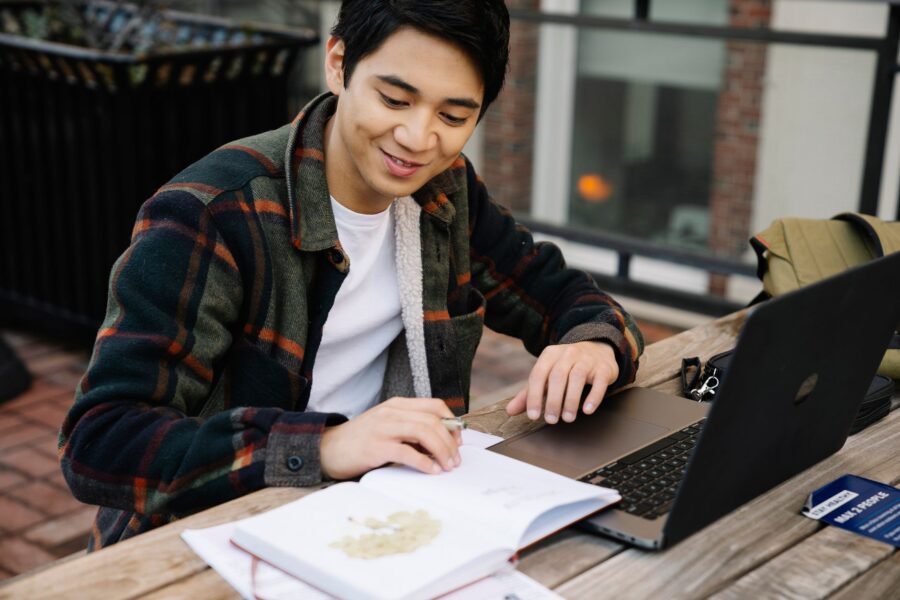 Student studying laptop