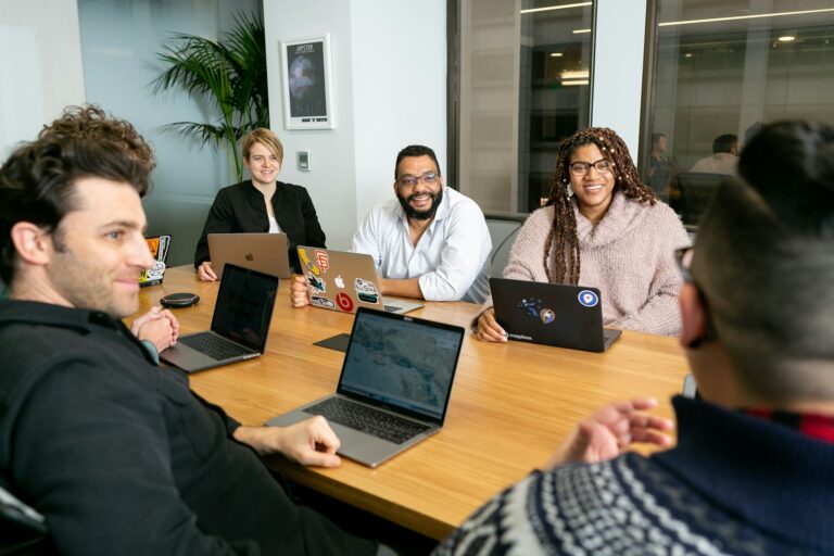 Team collaborating around