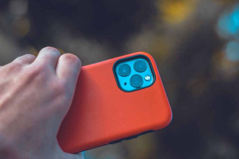 Person cleaning smartphone