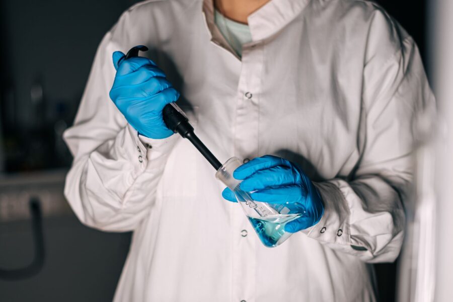 Scientist pipette crispr